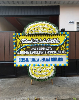 Papan Bunga Duka di Pelita